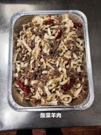 Lamb with pickled cabbage Catering tray of thin sliced lamb stir-fried with shredded pickled napa cabbage and whole dried red chilies